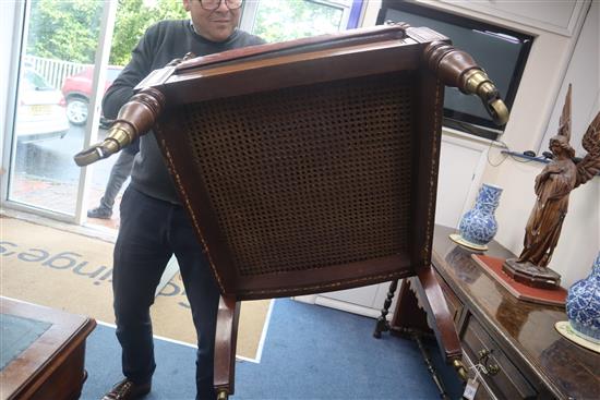A George III mahogany Bergere with leather squab